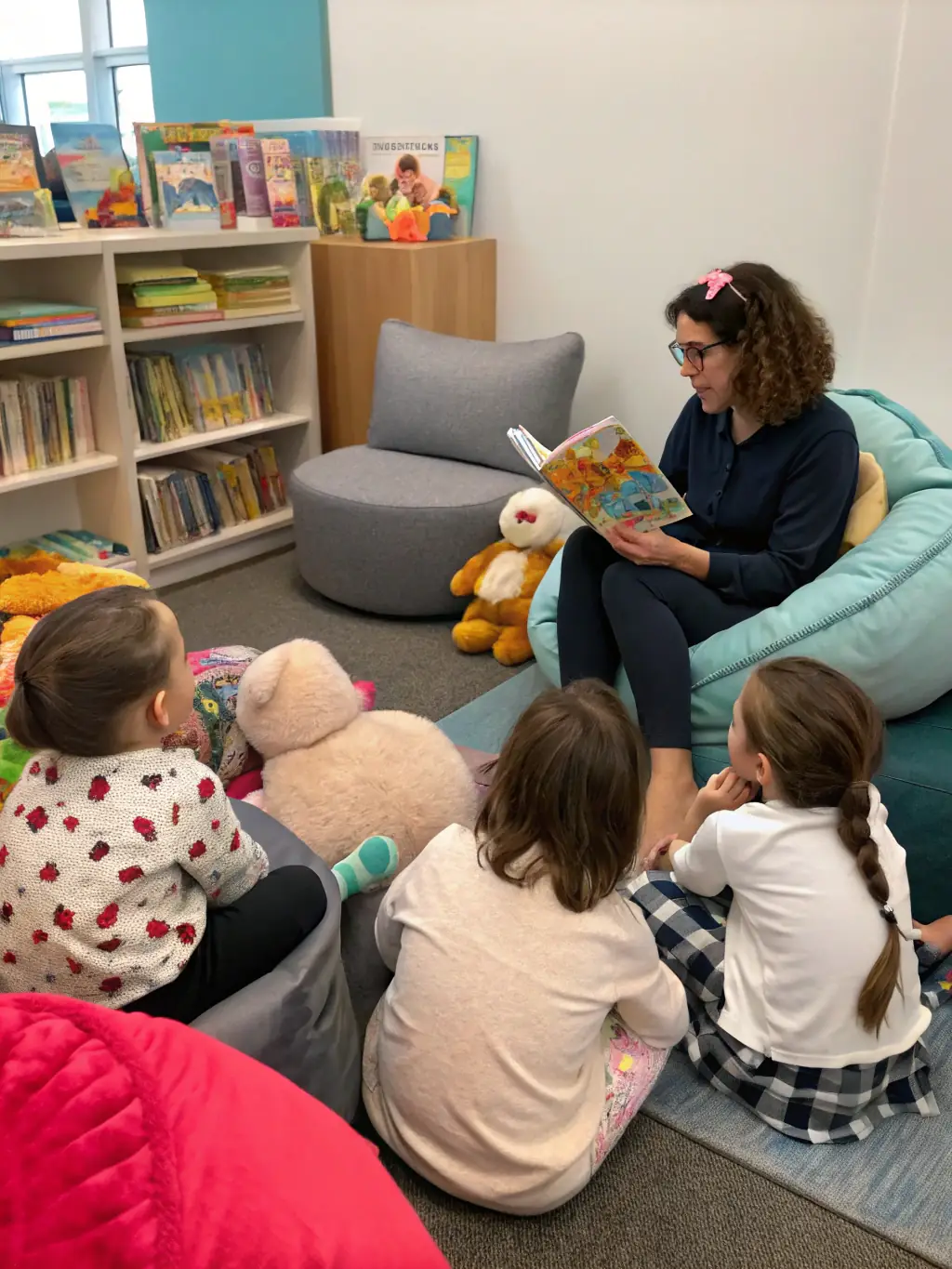 A photograph depicting children participating in an interactive storytelling session at the local library, led by a volunteer from LES MOTS DISANT.
